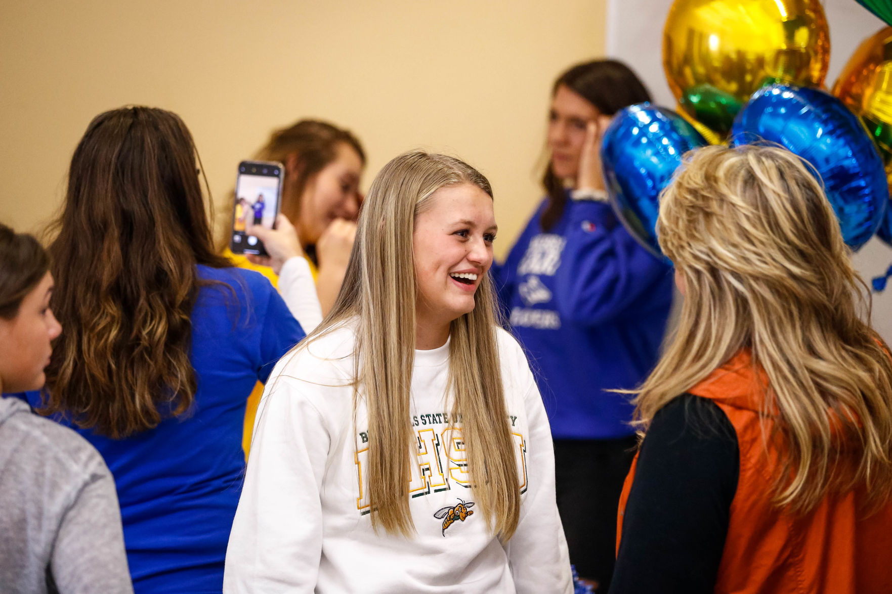 SIGNING DAY: Rampart athletes sign their National Letter of Intent